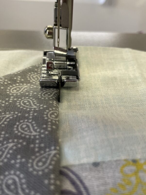 Singer Stitch in the ditch foot - Sewing Direct