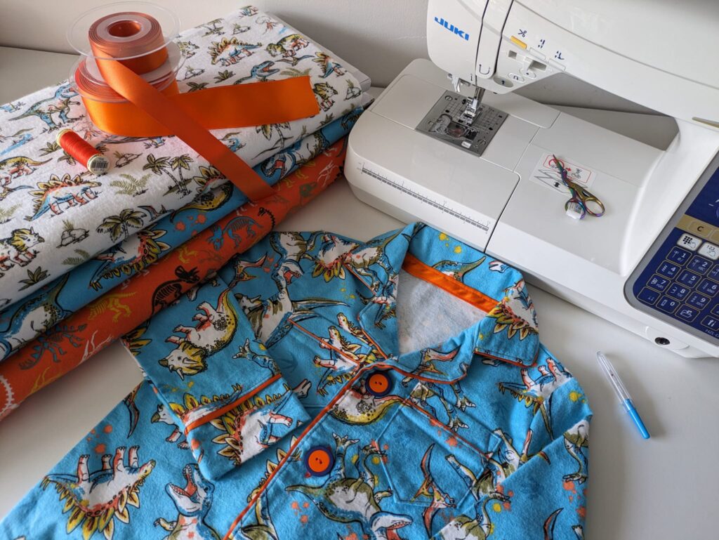 Flannel pyjamas by 3 wishes Totally Rawrsome collection and a Juki DX7 sewing machine